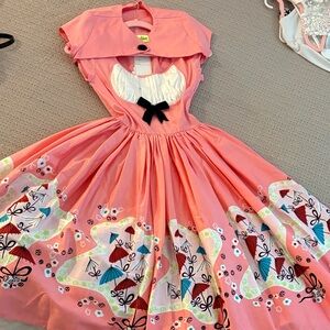 Vintage Style Pink Dress with Floral Print